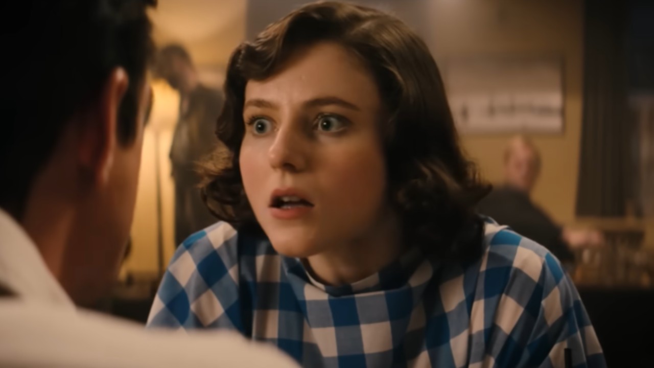 Thomasin McKenzie looking shocked in Fackham Hall. 