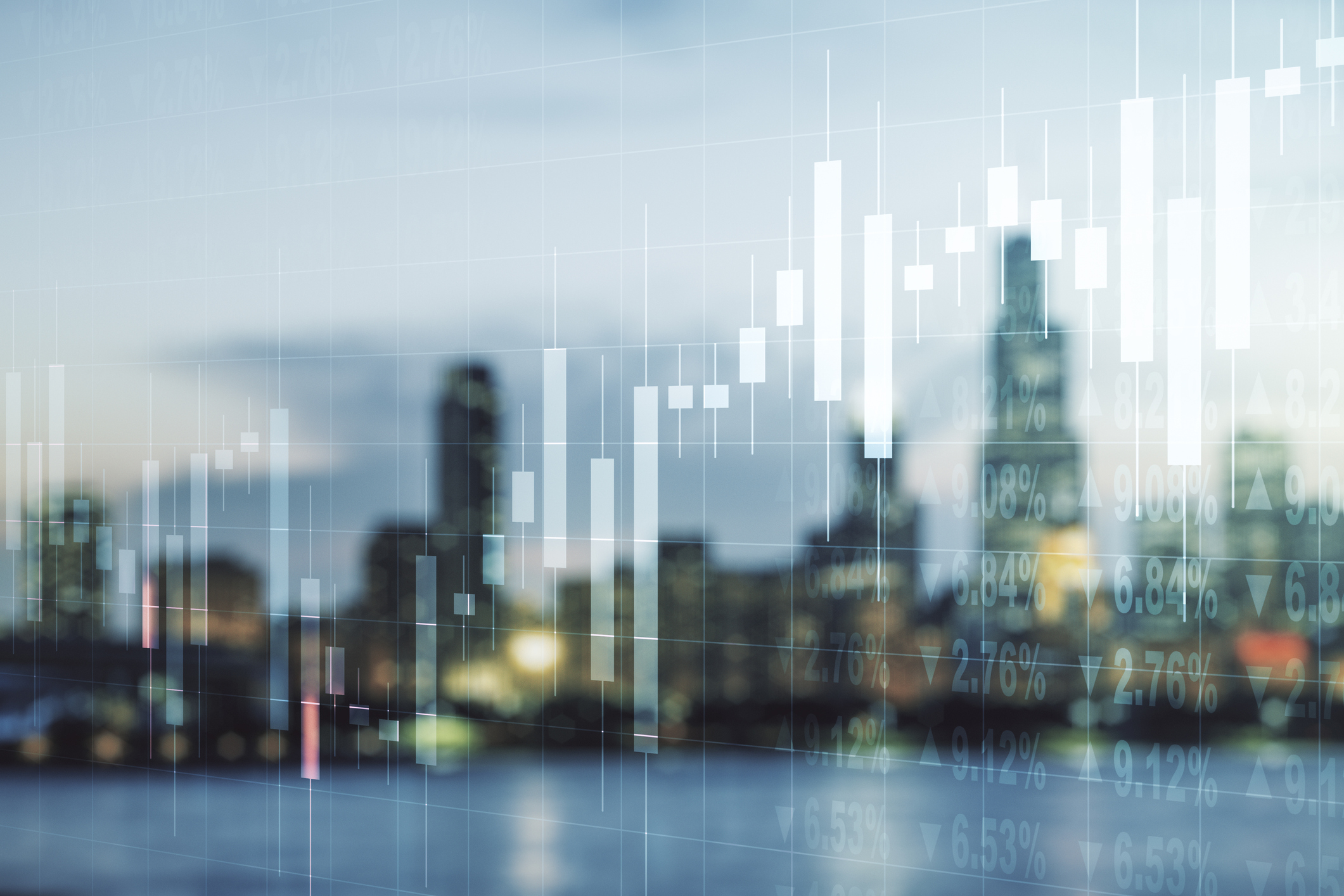 Financial chart superimposed over city skyline signifying top stocks, funds and investment trusts