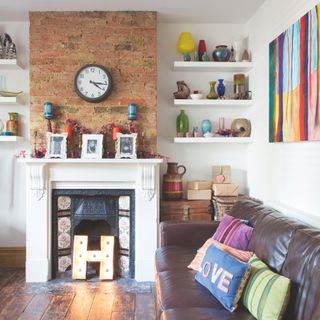 living room with brick chimney breast