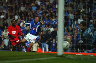 Matthew Taylor of Portsmouth goes past Jermaine Darlington of Wimbledon to score during the Portsmouth v Wimbledon Nationwide League Division One match at Fratton Park in Portsmouth, England on September 17, 2002. (Photo by Mike Hewitt/Getty Images)
