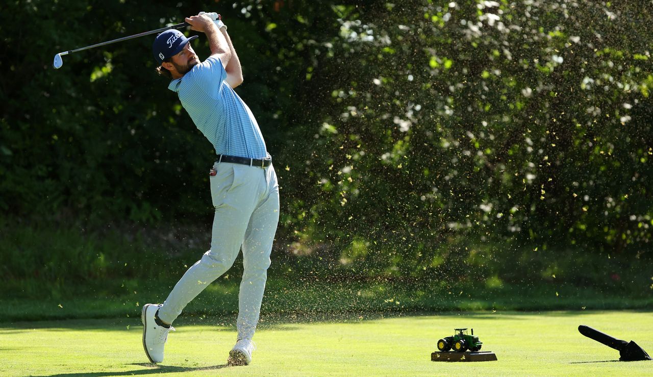 Cameron Young hits a wedge shot 