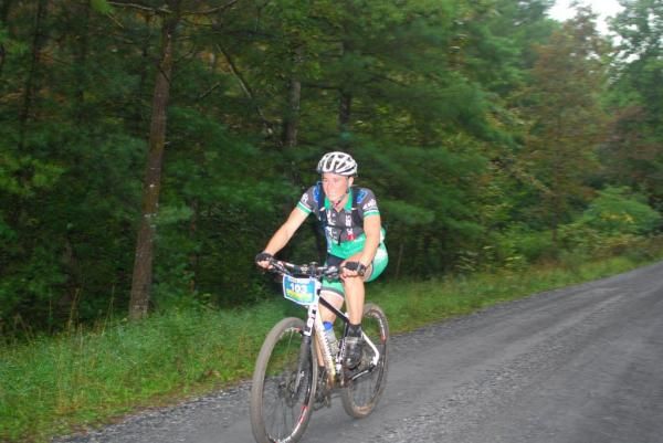 Karen Potter smiles, but she really doesn't like the dirt roads and pavement. She likes to roll the sweet singletrack at the Shenandoah Mountain 100
