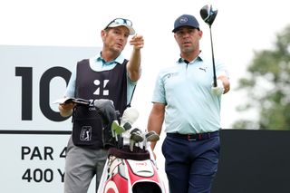 Gary Woodland (right) and his caddie, Brennan Little point something out in the distance at the 2024 Zozo Championship