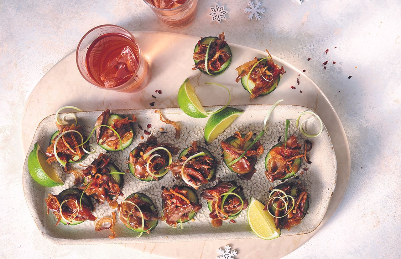 Crispy duck on cucumber canapes