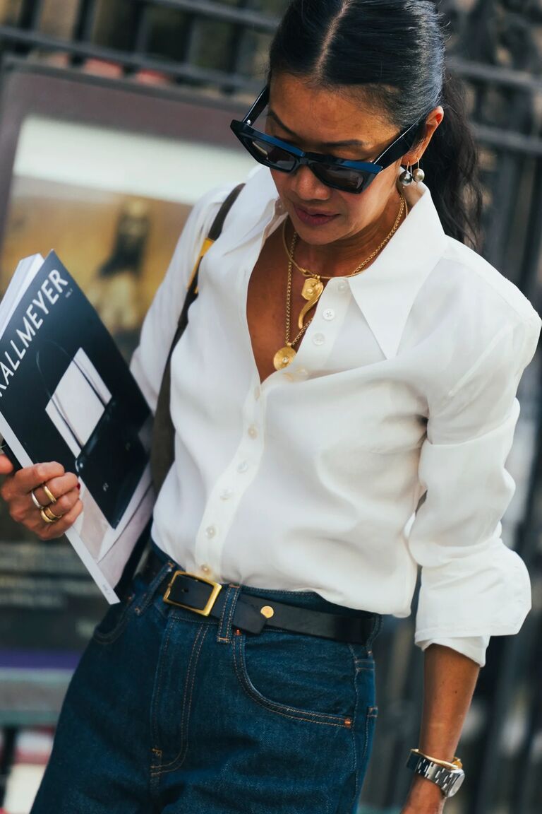Woman in NYFW street style denim outfit.