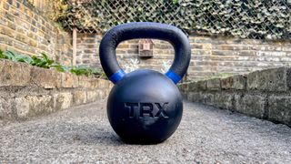 TRX Kettlebell on a garden path outside