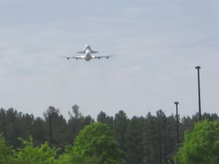 Shuttle Carrier Aircraft Carrying Discovery Flies Over Udvar-Hazy Center