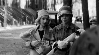 Ruth Negga and Tessa Thompson as Clare and Irene in Passing walk arm in arm