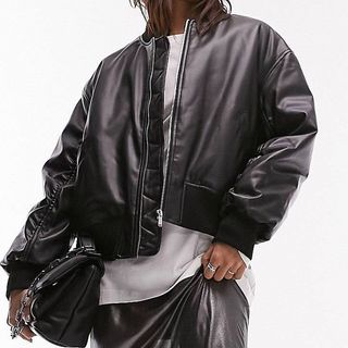 model wearing topshop black leather bomber jacket