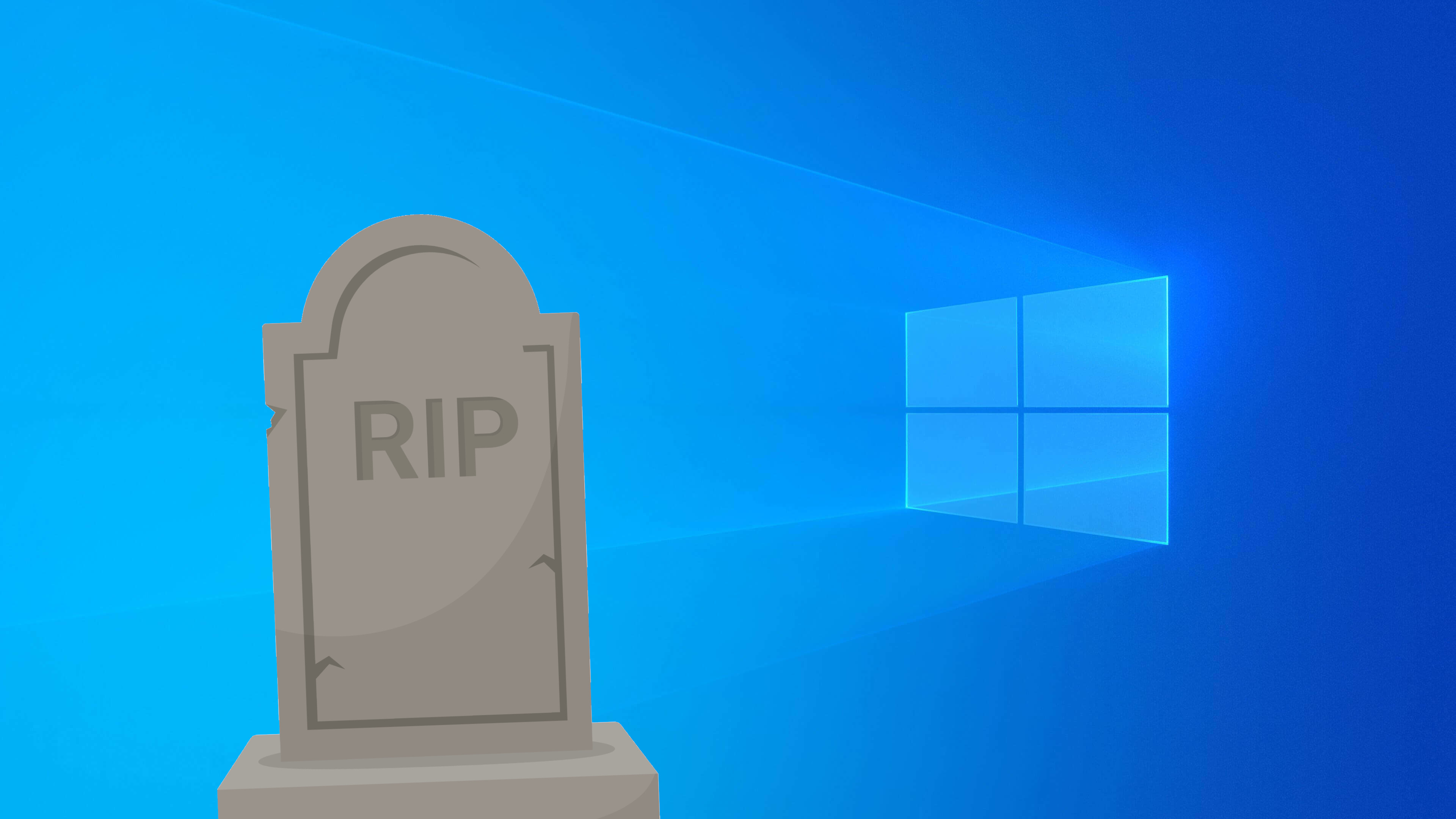 The default Windows 10 desktop wallpaper with a stock image of a gravestone in front of it.