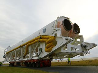 Antares Rocket Rolls out to the Pad