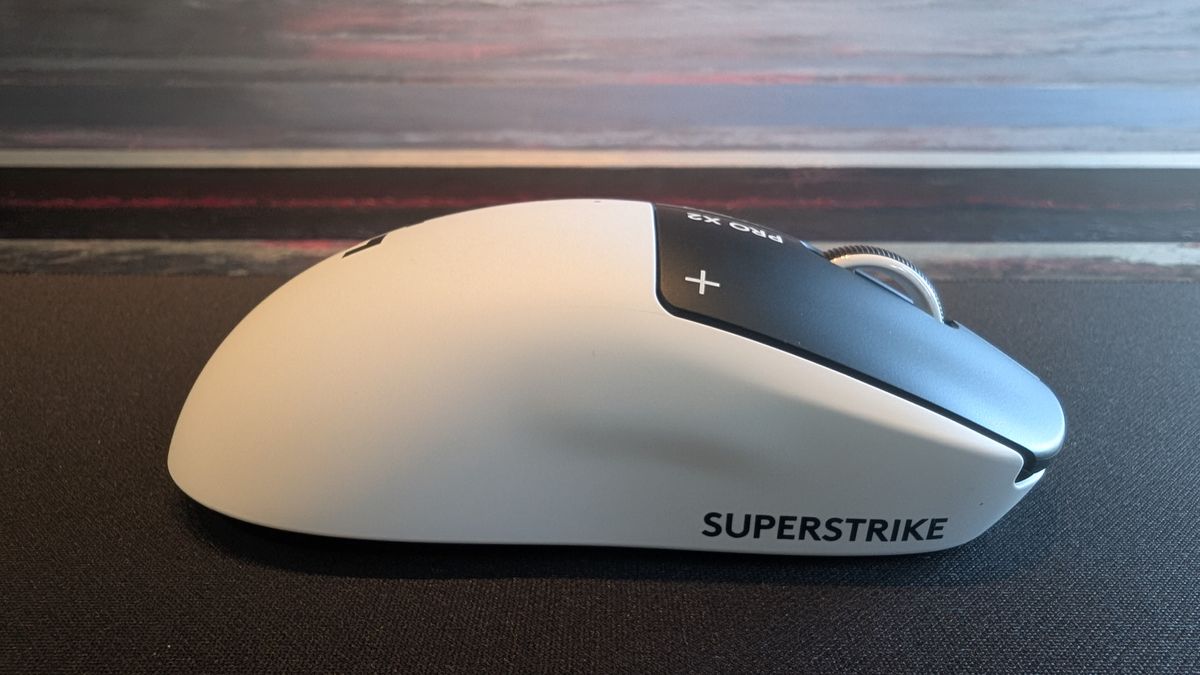 The Logitech G Pro X2 Superstrike pictured on a black mouse mat.