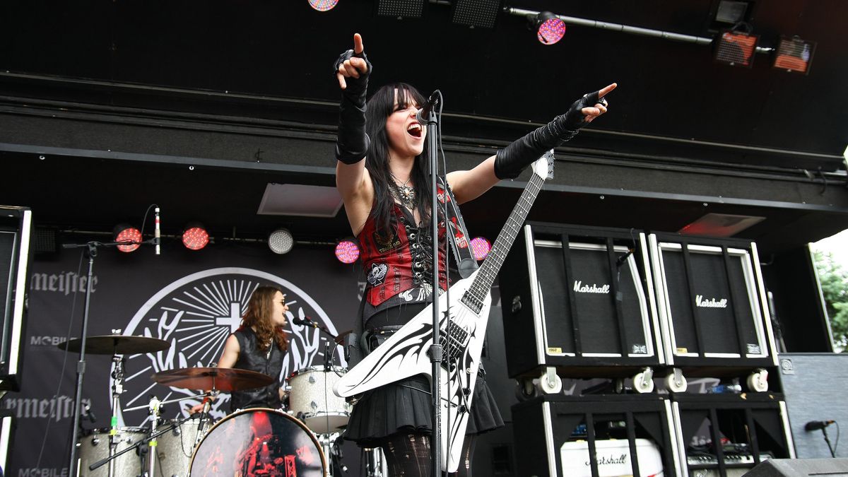 Lzzy Hale and Arejay Hale on stage in 2009