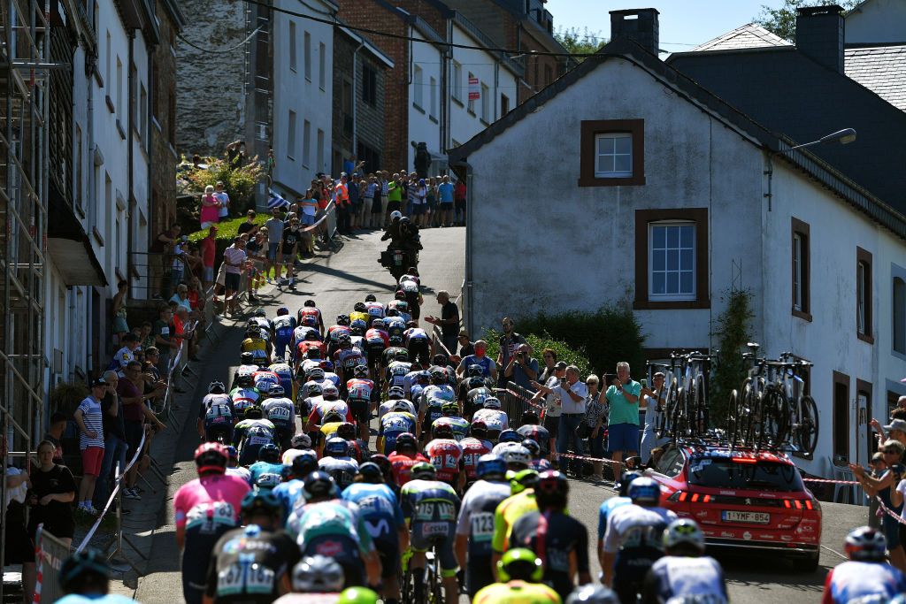 HOUFFALIZE BELGIUM SEPTEMBER 04 A general view of the peloton compete during the 17th Benelux Tour 2021 Stage 6 a 2076km stage from OttigniesLouvainlaNeuve to Houffalize BeneluxTour on September 04 2021 in Houffalize Belgium Photo by Luc ClaessenGetty Images