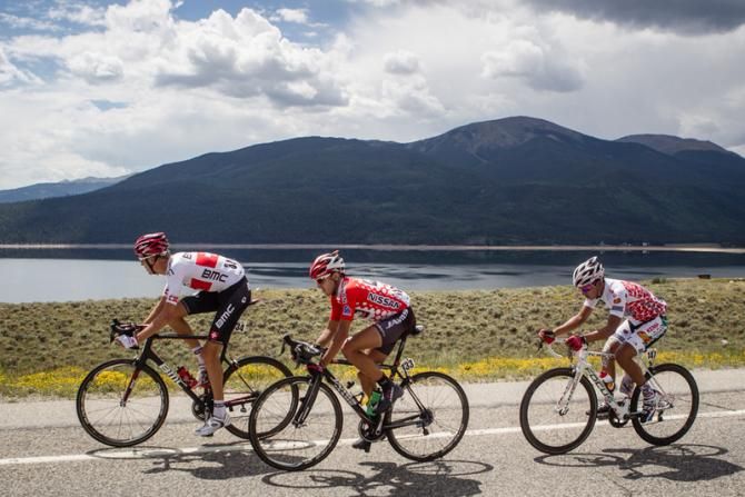The three breakaway riders pass by Twin Lakes Reservoir.