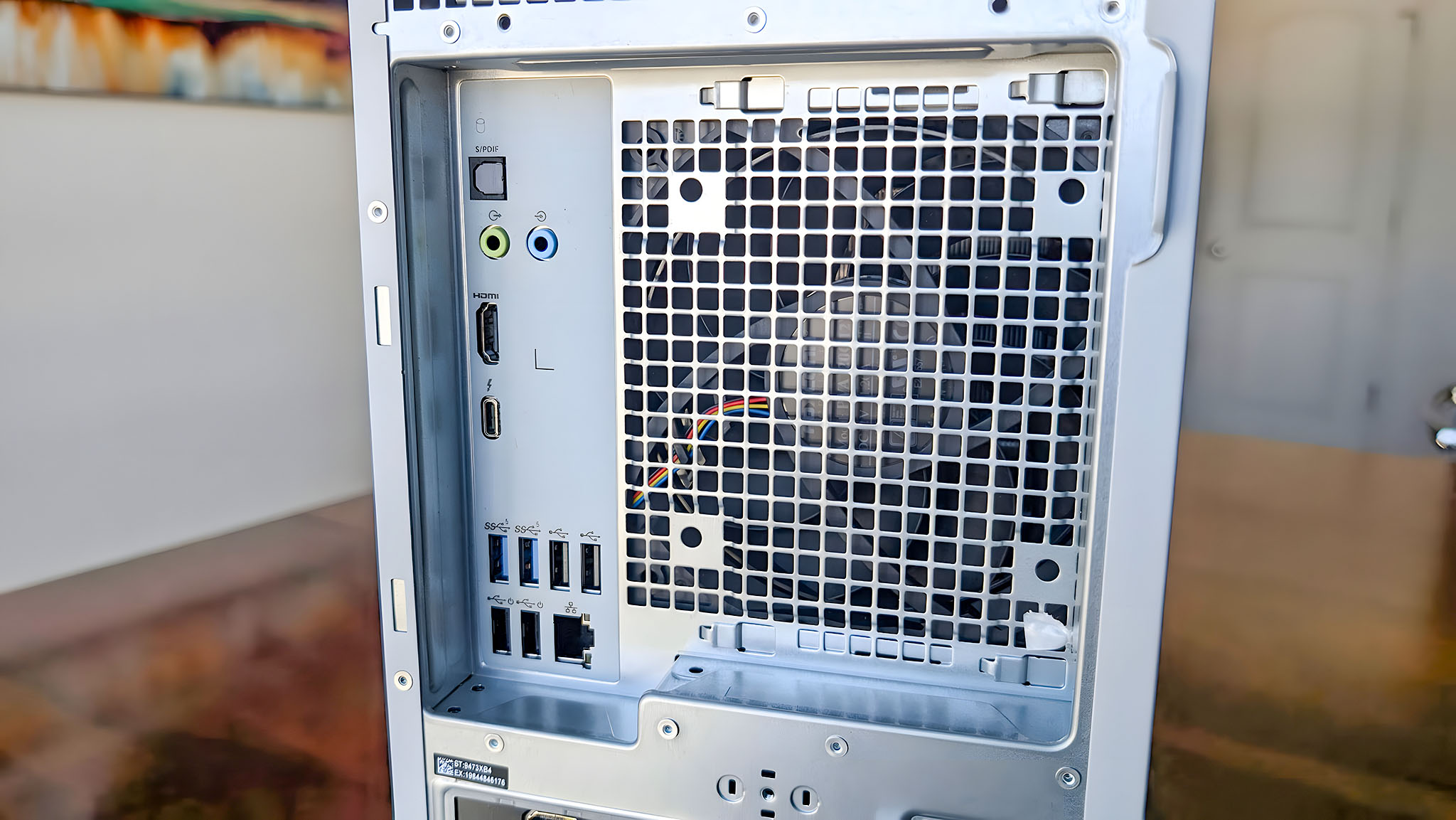 A closeup of the Dell Tower Plus EBT2250's back fan and ports. 