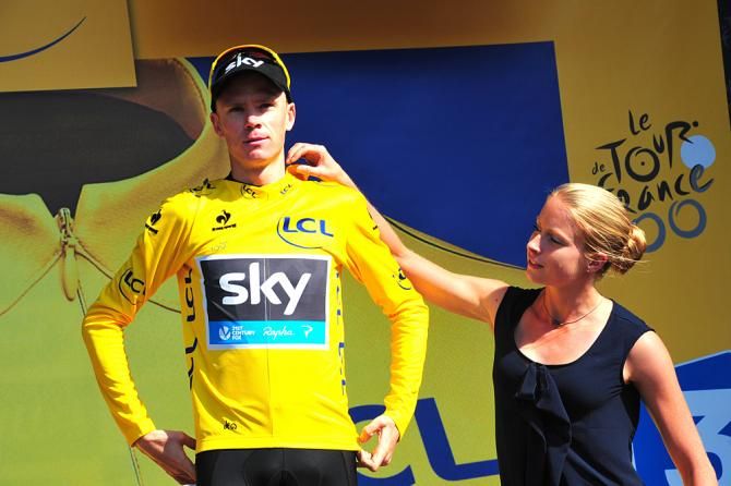 Chris Froome in yellow for another day
