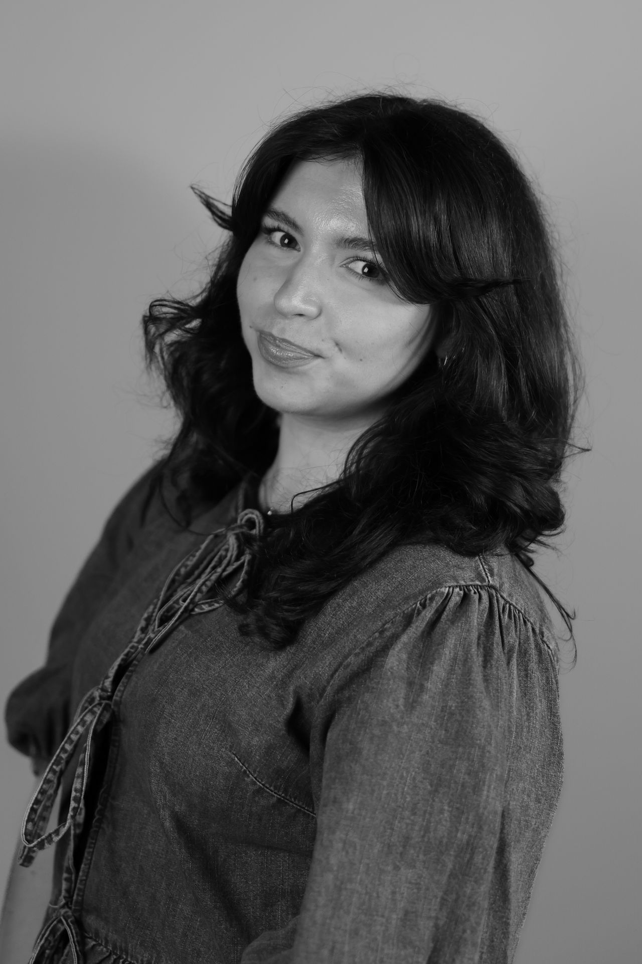 A portrait of a woman taken on a Canon EOS R6 Mark III