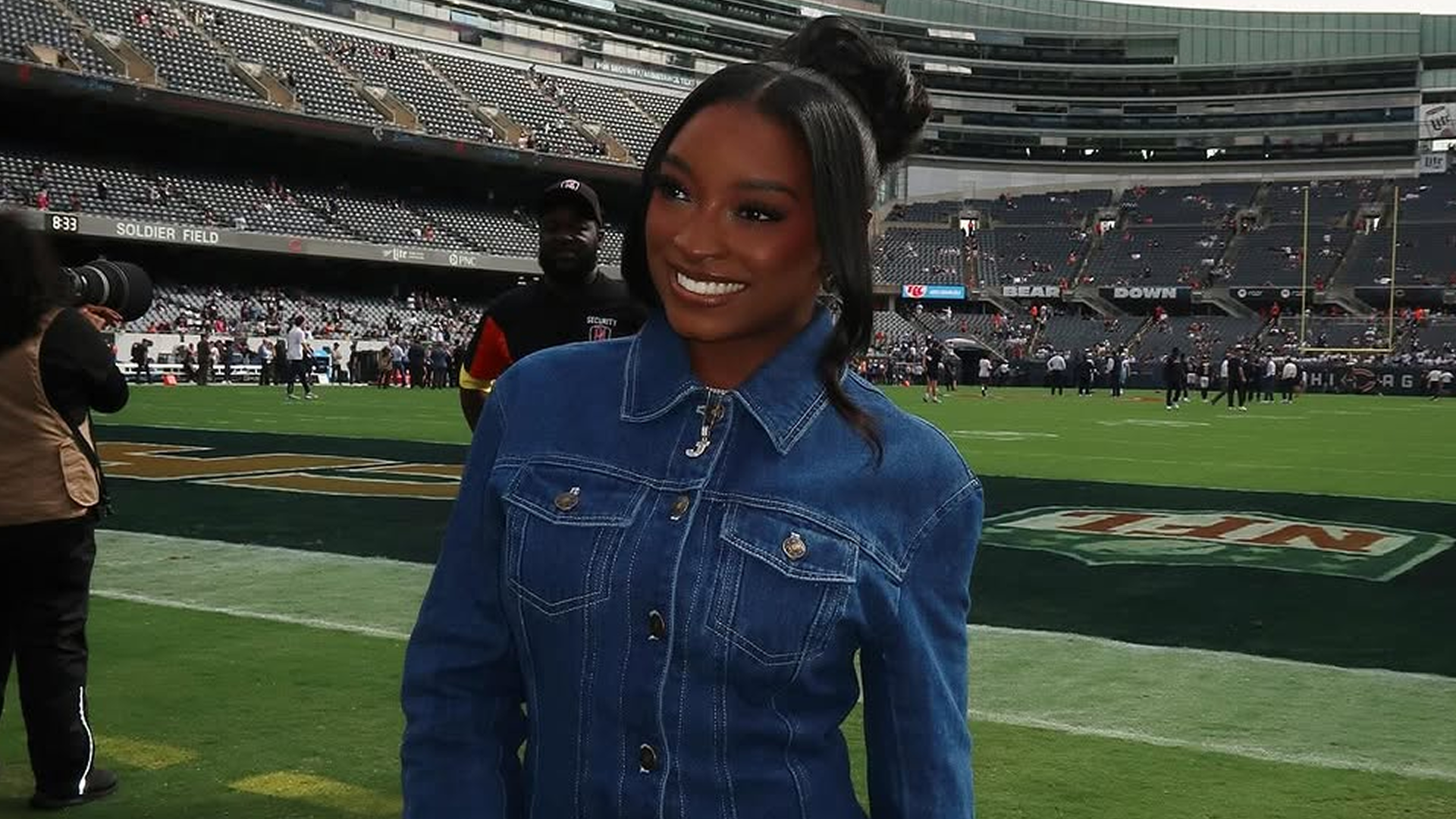 Simone Biles attended her husband&#039;s football game in the ultimate game day look: a denim skirt set, custom boots, and a Chanel bag