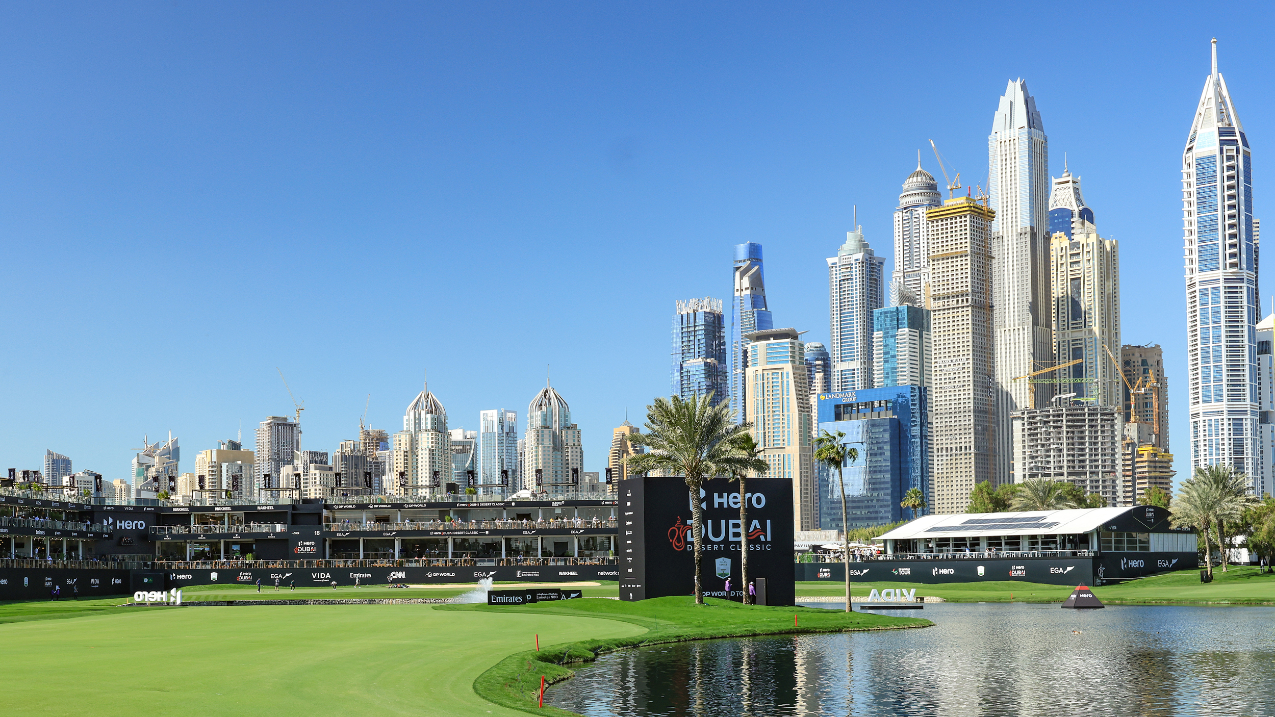 A general view of Emirates Golf Club's 18th hole with a view of Dubai's skyscrapers in the background
