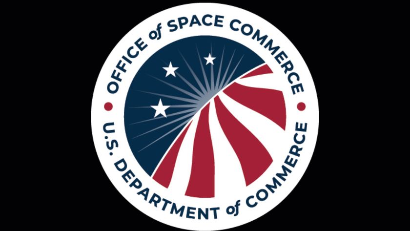 A circular badge showing the Office of Space Commerce with the words &quot;Department of Commerce&quot; on the circular image