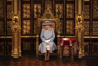 Queen Elizabeth II delivers the Queen's Speech in the House of Lord's Chamber during the State Opening of Parliament