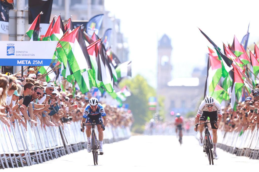 SAN SEBASTIAN SPAIN AUGUST 10 LR Julian Alaphilippe of France and Team Soudal QuickStep and race winner Marc Hirschi of Switzerland and UAE Team Emirates sprint at finish line during the 44th Donostia San Sebastian Klasikoa 2024 a 236km one day race from San Sebastian to San Sebastian UCIWT on August 10 2024 in San Sebastian Spain Photo by Gonzalo Arroyo MorenoGetty Images