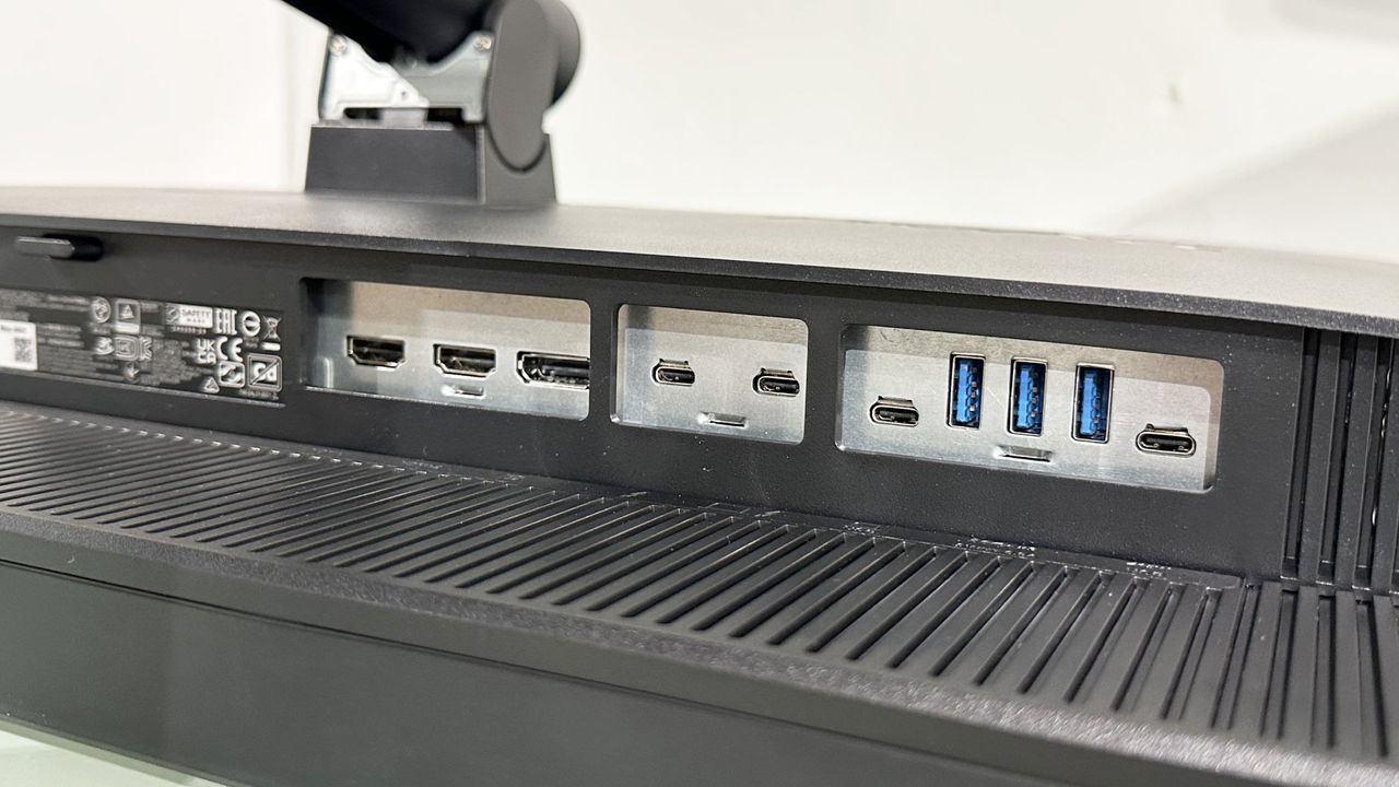 The Asus ProArt PA32KCX 8K monitor on a white desk in a home office during our review process