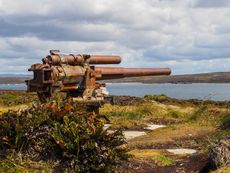 A corroding, rusty artillery cannon left over from the Falklands War. 