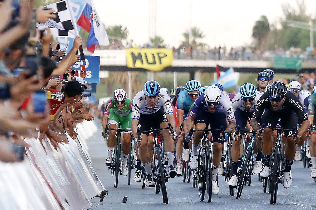 SAN JUAN ARGENTINA JANUARY 29 LR A mobile phone hits the face of Fabio Jakobsen of Netherlands and Team Soudal QuickStep while Sam Welsford of Australia and Team DSM Giacomo Nizzolo of Italy and Team Israel Premier Tech sprint to win during the 39th Vuelta a San Juan International 2023 Stage 7 a 112km stage from San Juan to San Juan VueltaSJ2023 on January 29 2023 in San Juan Argentina Photo by Maximiliano BlancoGetty Images