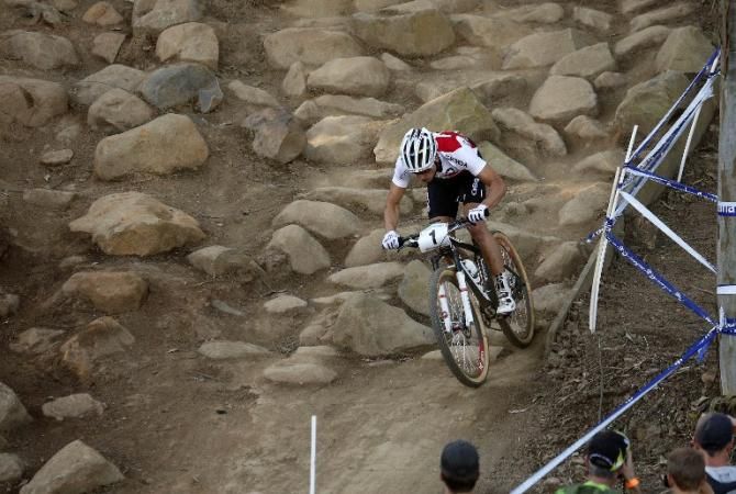 Nino Schurter (Switzerland) in a rock garden