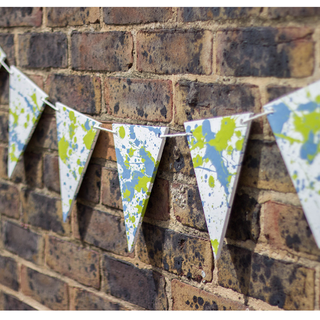 brick wall with colourful bunting flag