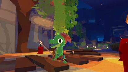 Screenshot from Lil Gator Game: In the Dark, showing a smiling alligator kid wandering around a dark, candle-lit cave.