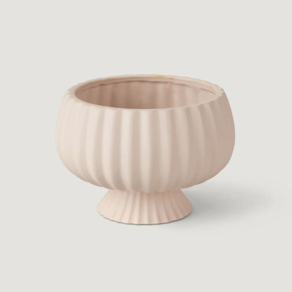 Pale pink compote vase with ridge pattern