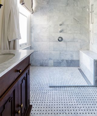 Blake Lively tile tip in a shower room with tiled cubicle