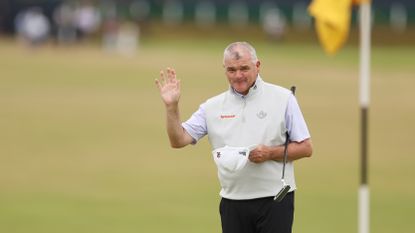 Paul Lawrite salutes the crowd during the R&A Celebration of Champions