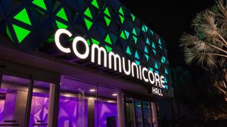 Communicore Hall exterior sign at night