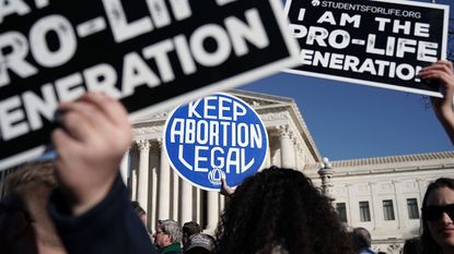 Abortion activists demonstrating outside the Supreme Court in 2018