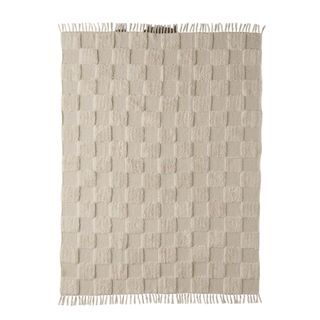 checkerboard print rug in beige