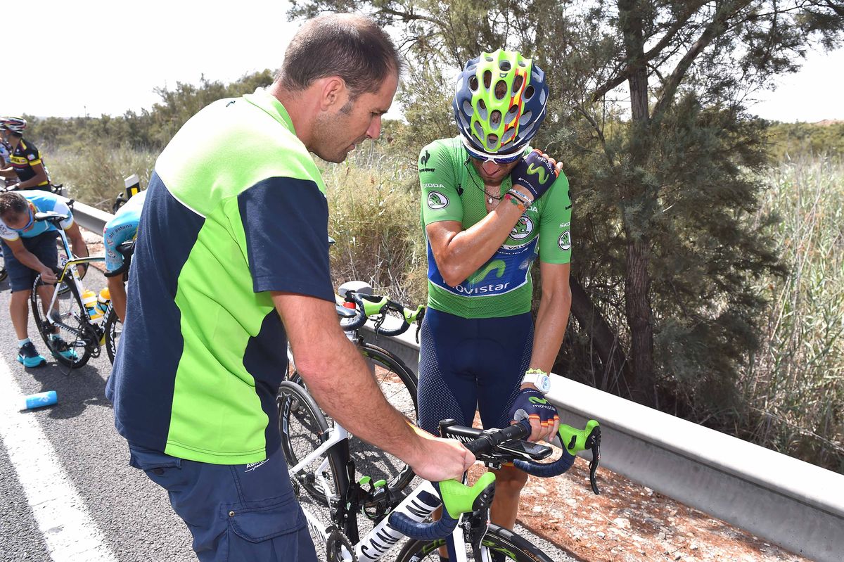 Alejandro Valverde (Movistar) checks his collarbone after crashing on Stage 9 of the Vuelta a Espa&ntilde;a
