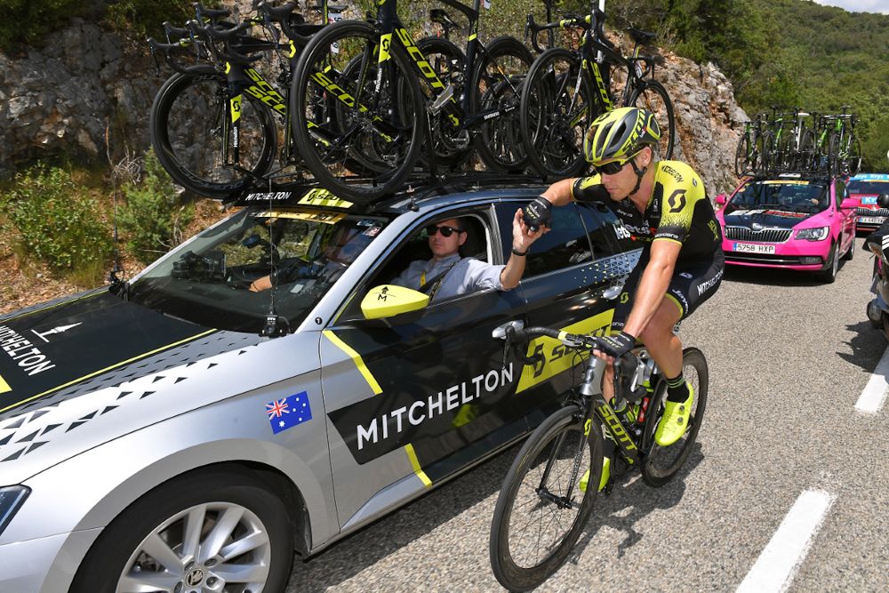 Michael Hepburn takes on fuel during stage 14
