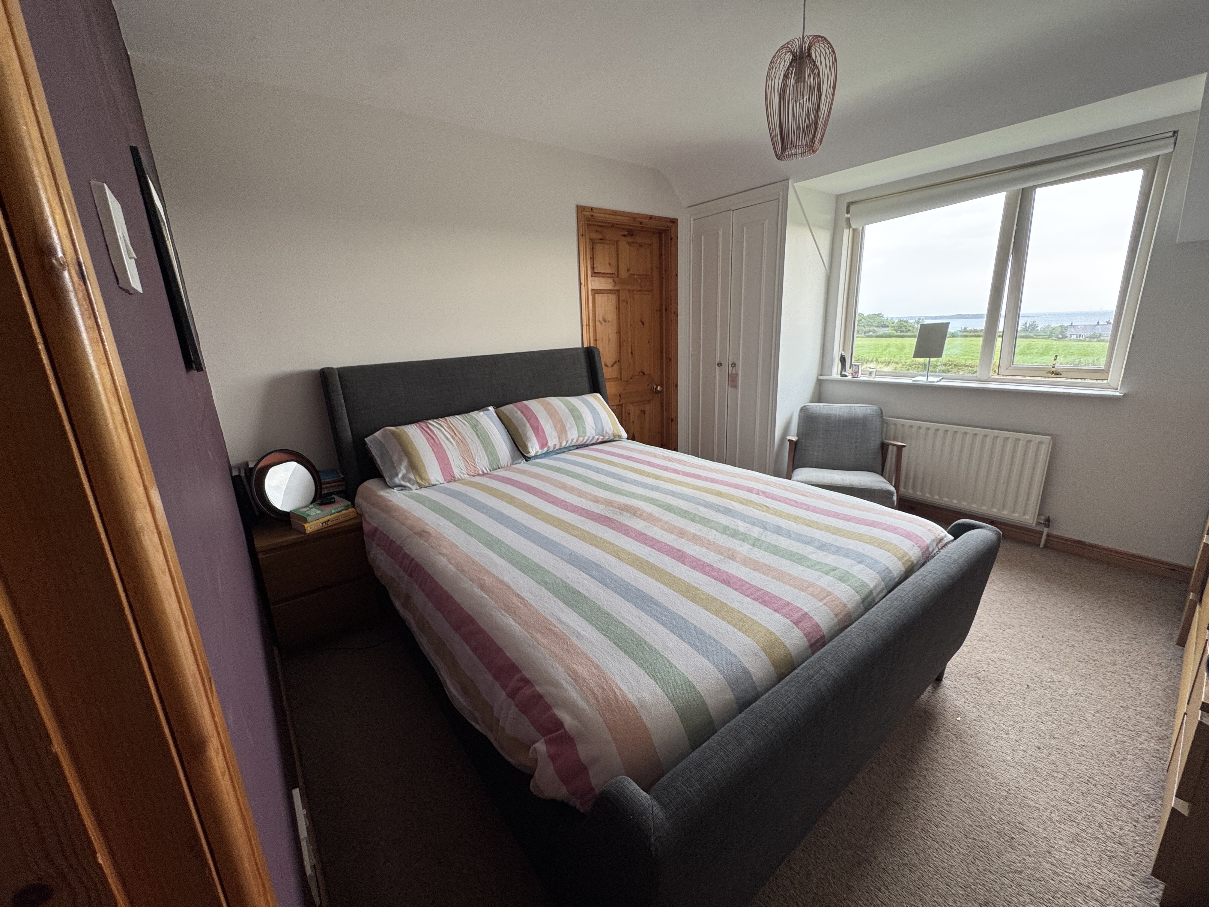 The Simba Hybrid Luxe mattress pictured on our tester's made up bed