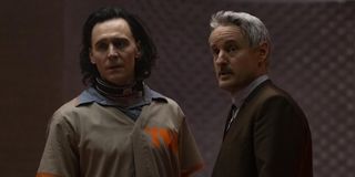 Loki (Tom Hiddleston) and Mobius M. Mobius (Owen Wilson) stare off on Loki (2021)