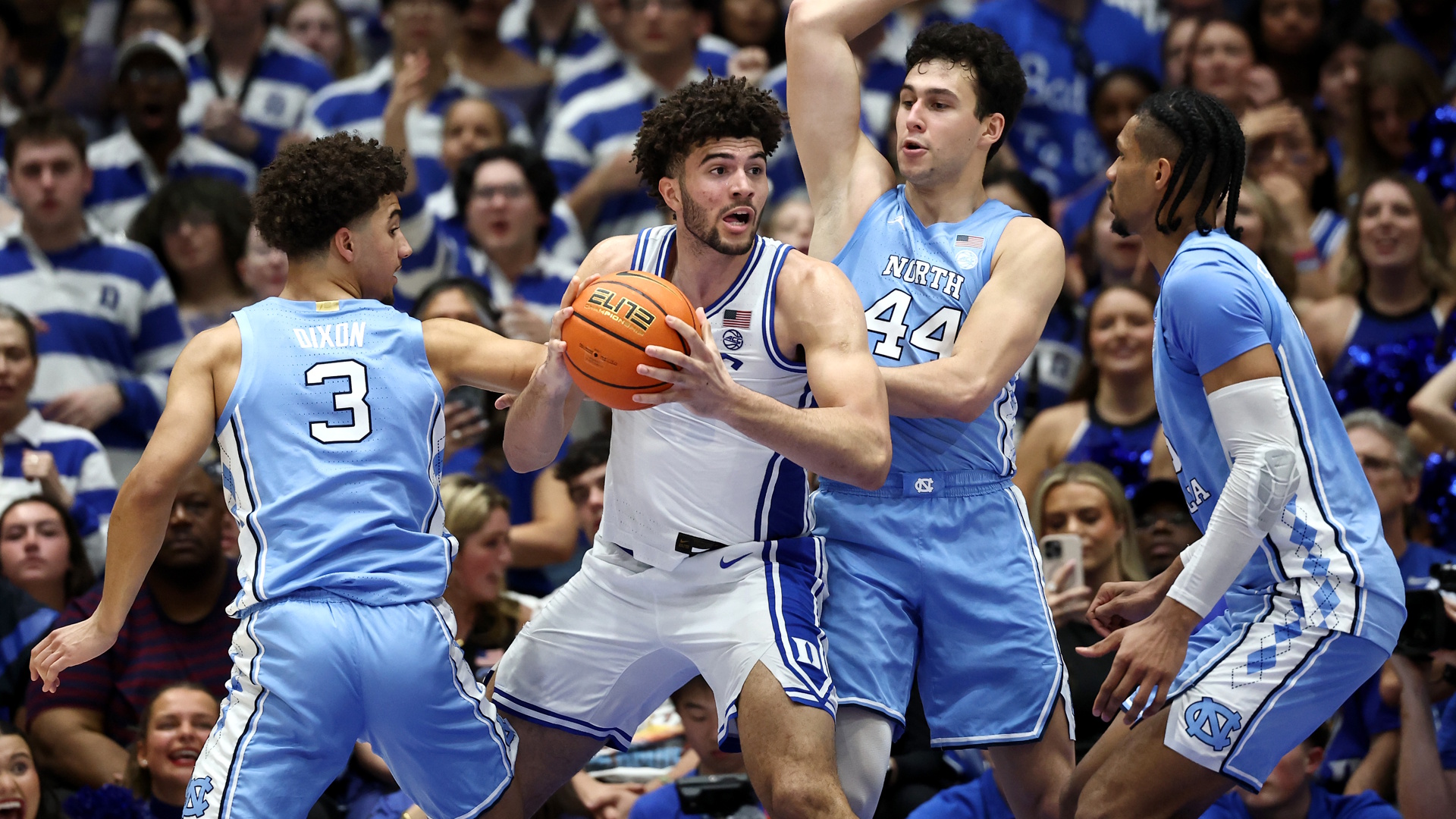 Cameron Boozer of the Duke Blue Devils posts up against the North Carolina Tar Heels during an NCAA college basketball game.