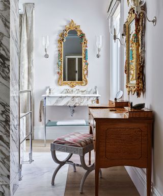 Powder room with marble tiles