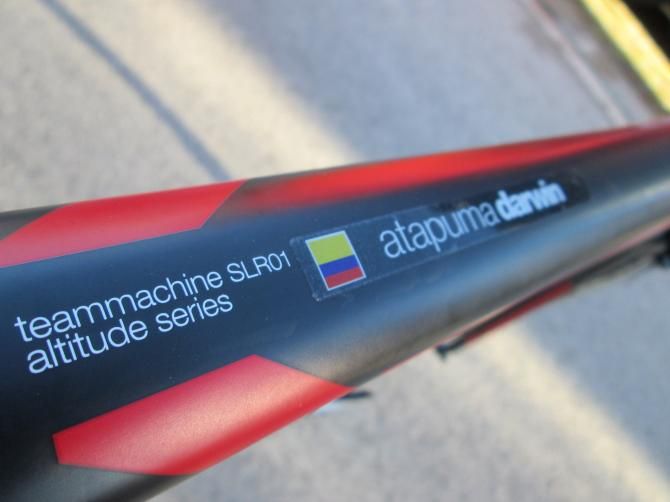 Top tubes on each BMC teammachine SLR01 feature its owner's name and country's flag.
