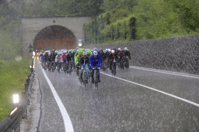 After a brief respite from the rain in a tunnel, it's once again monsoon time for the Giro peloton.
