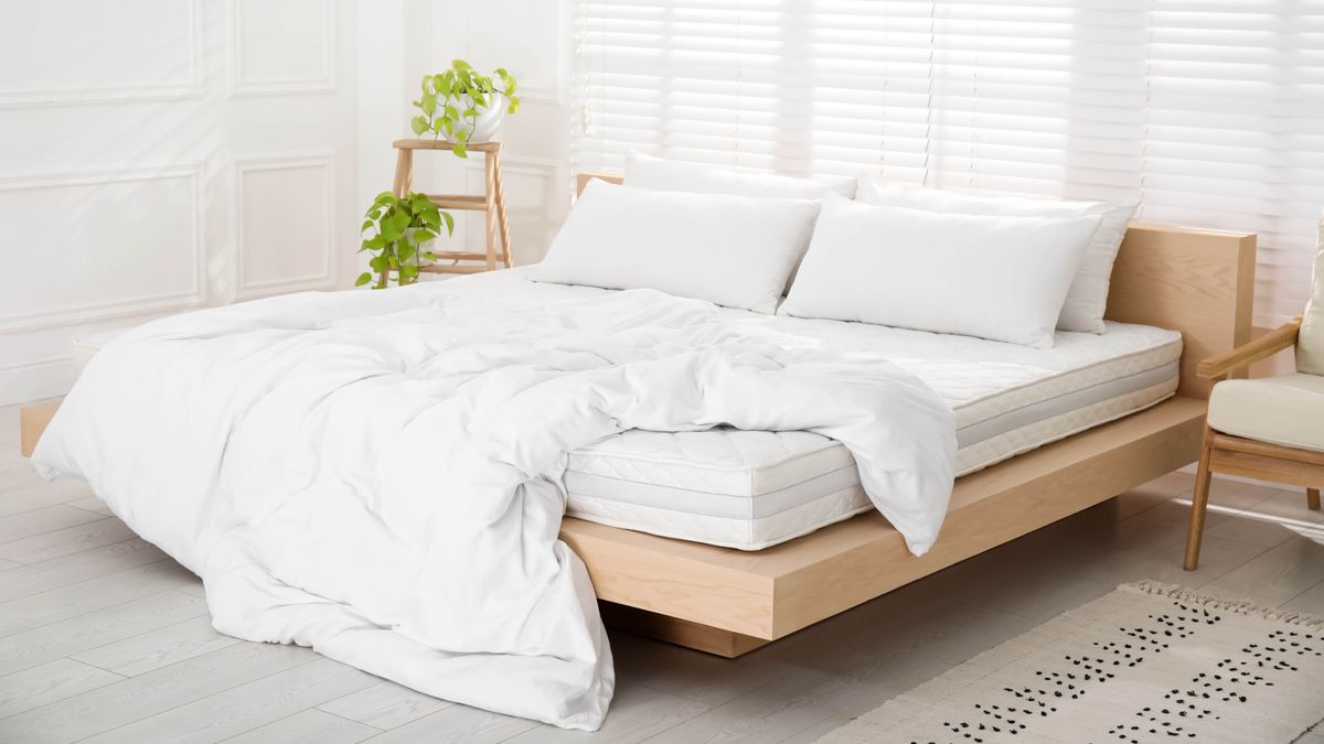 Bed with wooden frame