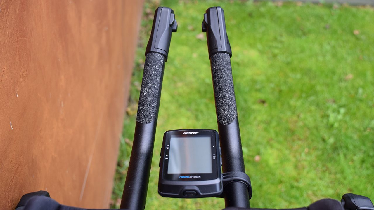Grip tape on the handle bar extensions help to stay in position whilst racing