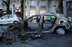 A burned car in a street of Paris on December 2, 2018, a day after clashes during a protest of Yellow vests (Gilets jaunes) against rising oil prices and living costs. 
